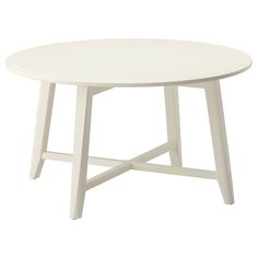 a white table on a white background with no one around it or the table top