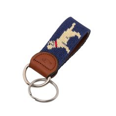 Treat your keys to our needlepoint keychains by giving them a colorful taste of your personal style. Our hand-stitched needlepoint key fob is 1" wide by 3" long (not including D-Ring) and is finished with full grain leather. Top quality, richly colored cotton thread is hand stitched on each key fob to ensure the detailed needlepoint patterns will continue looking great for years to come. Each key fob includes one key ring measuring 1.125" Huck Venture was founded with an adventurous spirit and a Keychain Strap, Keychain Lanyard, Key Fob Aesthetic, Key Ring, Needlepoint Keychains, Needlepoint Key Fob Ideas, Key Chain, Handmade Needlepoint Keychain, Needlepoint Keychain