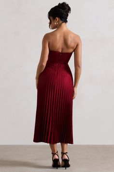 Encapsulate elegance in Bordeaux, our berry midi dress. This dress expertly cut in a premium satin creates a sophisticated feminine silhouette, with a sweetheart neckline and flattering structured corset bodice, the pleated skirt creates a romantic sense of movement. Style Bordeaux with our Hear Me court heels and a sleek bun for a classic look at your next occasion.  Features - Premium satin- Corset bodice- Sweetheart neckline - Strapless- Invisible zip closure - Pleated skirt- Midi length Sizing & Fit Model is 5'6 and wears UK size 8 / US size 4Product Information Designed exclusively by Club L London Unlined with no stretch Premium satin in Berry (100% Polyester) 125cm total length SKU: CL132315037 Structured Corset, Style Midi Dress, Sleek Bun, Black Dress Prom, Black Tie Gala, Court Heels, Satin Corset, Party Dress Long Sleeve, Corset Bodice