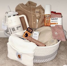 a white basket filled with personal care items