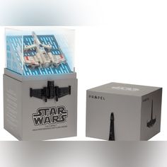 a box with a star wars model in it