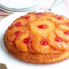 a pineapple upside down cake on a white plate