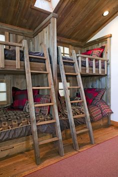 a bunk bed with two sets of ladders