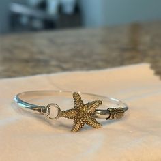 Starfish Hook 14k Gold Cape Cod Bracelet Starfish And Wrap Gold, Rest Sterling Silver. Cape Cod Bracelet, Capes For Women, Cape Cod, Starfish, Womens Jewelry Bracelets, Cape, Silver Gold, Women Jewelry, Sterling Silver