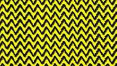 an abstract pattern with black and yellow colors