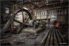 an old factory with pipes and machinery