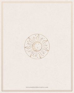 an image of the sun in a golden frame on a white paper with gold trim