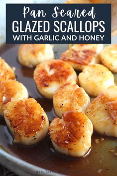 pan seared glazed scallops with garlic and honey in a skillet