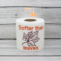 a roll of toilet paper with the words softer than leaves on it