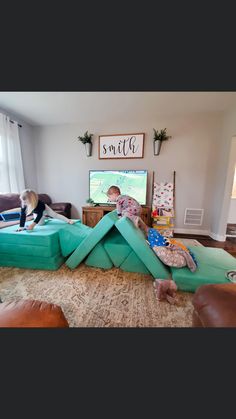 a man laying on top of an inflatable bed