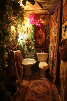 a bathroom decorated in bohemian style with plants and rugs on the floor next to two toilets