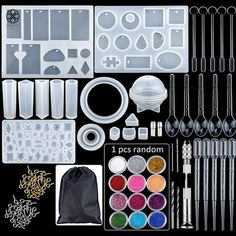 an assortment of crafting tools and supplies are shown in this image, including plastic trays