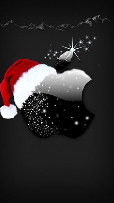 a black background with a santa hat on it's head and snow flakes