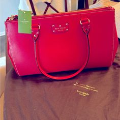 Brand New Kate Spade Martime Purse Never Been Carried. Stored In Dust Bag. Still Has Tag. Sku-Wkru1659 Style-Wellesley Color-Pillboxred In Pristine Condition! Unsnaps To Widen. 16" Wide, 10" Tall. Will Mail In Dust Bag. Gorgeous Color. Photos Don’t Do It Justice. Kate Spade Red Rectangular Shoulder Bag, Kate Spade Red Shoulder Bag For Formal Occasions, Red Kate Spade Shoulder Bag For Formal Occasions, Kate Spade Red Formal Shoulder Bag, Kate Spade Red Formal Bag, Formal Red Kate Spade Bag, Red Kate Spade Shopping Bag, Red Kate Spade Bag For Shopping, Classic Red Kate Spade Bag