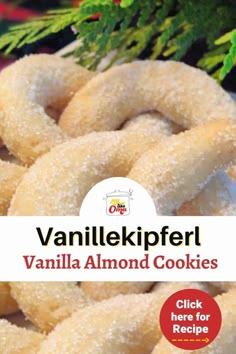 a pile of vanilla almond cookies sitting on top of a table