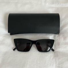 Authentic Ysl Saint Laurent Sl 276 Mica 53mm Cat Eye Sunglasses Brand: Saint Laurent Color: Shiny Black/Grey Solid 100% Authentic. Excellent Used Condition. No Defects. Authenticity Card, Original Case, And Cloth Included. Purchased From Nordstrom In January 2023. Screenshot Of Order Confirmation Is Included. Cat Eye Sunglasses With A Sharp, Angular Look Are Fitted With Lightweight Nylon Lenses For A Bold Style That's Also Super Wearable. - 100% Uva/Uvb Protection - Frames Compatible With Corrective Lenses - Temples Engraved With Saint Laurent Paris - Dimensions: Lens 53 Mm / 2.1", Bridge 16 Mm / 0.6", Temple 145 Mm / 5.7" - Acetate - Made In Italy Smoke Free Home. All Orders Ship Sa Ysl Glasses Sunglasses, Sharp Sunglasses, Sl 276 Mica, Fancy Glasses, Ysl Saint Laurent, Saint Laurent Sunglasses, Order Confirmation, Sunglasses Brand, January 2023