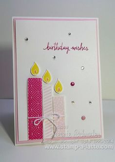 a birthday card with candles and confetti