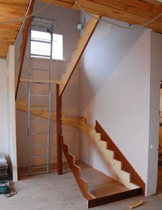 an empty room with some stairs in it