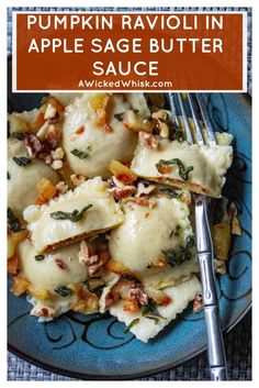 pumpkin ravioli in apple sage butter sauce on a blue plate with a silver fork