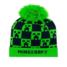 Boys Minecraft beanie. Winter won't freeze your Minecraft fan's style game in this gamer inspired green and navy winter hat. With a check pattern of creeper faces and a contrasting green pom pom, this Minecraft bobble hat is a must have for their look table. The green brim also has the logo embroidered on to complete this soft knit hat. Cap off their winter wardrobe with this Minecraft winter wear! Size: One Size.  Gender: male.  Age Group: infant. Snow Biome Minecraft, Minecraft Hat, Minecraft Accessories, Minecraft Merchandise, Minecraft Logo, Navy Beanie, Boys Beanie, Bobble Hat, Fan Style