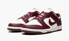 The Women’s Nike Dunk Low “Dark Beetroot” is a women’s exclusive release of the retro basketball shoe in a two-tone, white-and-maroon style.  An October 2021 colorway, the “Dark Beetroot” is one of multiple easy-wearing Dunks to release in women’s sizing in 2021.  White leather appears on the perforated toe, mid-panel, collar, and heel.  The overlays and Swoosh are constructed in Dark Beetroot-colored leather.  A tonal “Nike” logo is embroidered on the heel and maroon “Nike” and Swoosh branding Nike X Travis Scott, Team Red, Red Team, Adidas Spezial, Dunks Nike, Nike Dunk High, Nike Shox, Air Huarache, Air Jordan 3