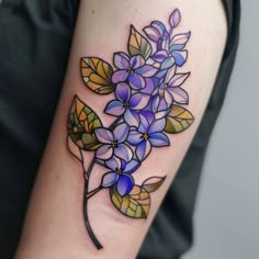 Versatile Lilac Tattoo Sketches Pretty Colored Tattoos, Dark Color Flower Tattoo, Purple Line Tattoo, Stained Glass Flower Tattoo, Colorful Flower Sleeve Tattoos For Women, Violet Flower Drawing Tattoo, Insect Sleeve Tattoo, Traditional Flower Tattoo Sleeve, Purple Flowers Tattoo