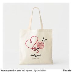 a tote bag with knitting crochet logo on it