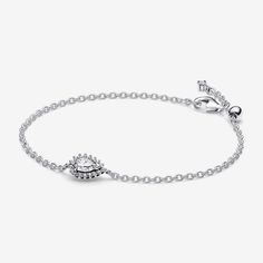 Shine brighter than ever when you wear the Sparkling Pear Halo Chain Bracelet. This bracelet features a striking pear-shaped stone raised slightly above a delicate pavé halo. A V-shaped prong and two round prongs hold the center stone in place, while a clasp with an adjustable silicone ball keeps your bracelet secure. A small stone dangles from one end of the chain. A reimagined classic with ample sparkle and dimension, this sterling silver chain bracelet makes a stunning statement and a perfect gift. - Pandora Sparkling Pear Halo Chain Bracelet - Sterling silver / Cubic Zirconia - Sz. 7.1 in Pear Halo, Silver Chain Bracelet, Lab Created Diamonds, Sterling Silver Chain, Sterling Silver Bracelets, Pear Shaped, Sterling Silver Chains, Bracelet Making, Chain Bracelet