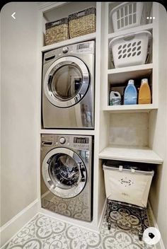 a washer and dryer are in the closet next to each other with baskets on them