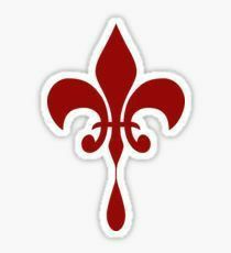 a red fleur de lis sticker on a white background