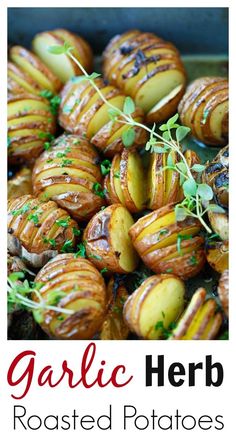 roasted potatoes with herbs and seasoning in a pan