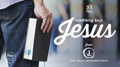 a man holding a bible in his hand with the words nothing but jesus on it