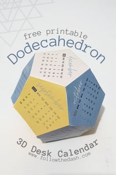 an origami calendar is displayed on a white surface with the words free printable doodecahedron