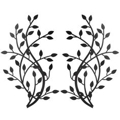 two metal wall hangings with leaves and branches on the top, one is black