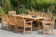 an outdoor dining table and chairs set up on a patio with plants in the background