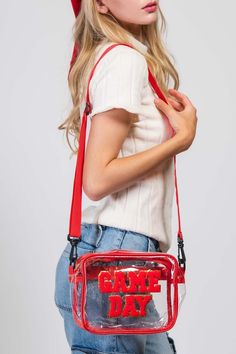 Clear stadium approved GAME DAY cross body🏈 THE DETAILS✨ -Clear transparent water-resistant stadium approved crossbody bag with adjustable strap -GAME DAY chenille letter detailing  -Available in Red, Royal Blue, Orange, and Purple -Measurements Height: 7" Width: 9" Depth: 3" Sporty Rectangular Game Day Bag, Game Day Bag Straps, Clear Game Day Purses, Clear Stadium Crossbody Bag, Clear Crossbody Shoulder Bag For On-the-go, Pearl Shop, Outdoor Event, Transparent Design, Scarf Gift