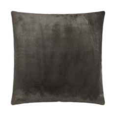 a dark gray pillow on a white background