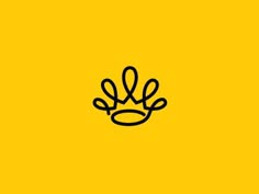 a yellow background with a black crown on it