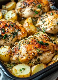 chicken, potatoes and parsley in a baking dish