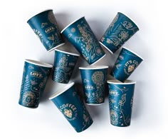 there are many cups that have gold designs on them