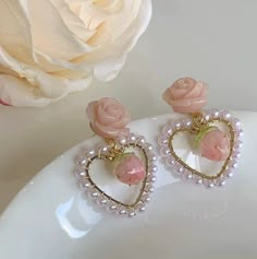 Cutest wild rose floral stud earrings with pastel pink baby strawberry drop and pearl beaded heart shaped hoop dangle. Super adorable accent, girly pinky dreamy vibes. A pair of handmade delicate unique earrings. Perfect gift for girls, a little cute spice to elevate your style! 💎 Features: ♥ Handcrafted Earrings ♥ Material: gold plated sterling silver ♥ Main stone: cultured pearl bead, resin, acrylic ♥ Push Closure 💎 Details: ♥ Approximate Measurements: - Length: 1.5 inches - Width: 1 inches Heart Shaped Pearl Earrings, Aesthetic Items, Pink Gift Ideas, Coquette Core, Strawberry Earrings, Aesthetic Accessories, Beaded Heart, Diy Collier, Romantic Heart