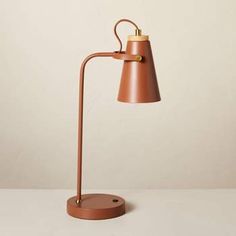 a lamp that is on top of a table