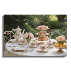 a table topped with plates and cups filled with pastries