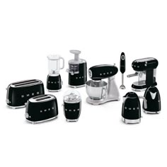 an assortment of black and white kitchen appliances