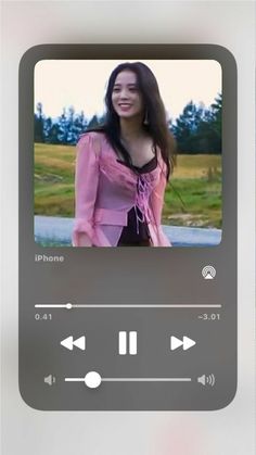 an image of a woman with headphones on her ear and music player in the background