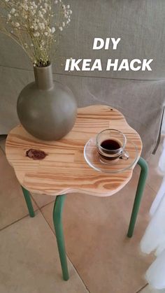 a small table with a cup of coffee on it