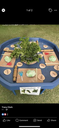 a blue table topped with lots of different items