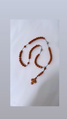 "Rosario de barro con filigrana bordada en la cruz, red clay rosaries handmade in oaxaca  Size 18\" long" Traditional Handmade Rosary Bracelet With Round Beads, Traditional Handmade Rosary Bracelet, Traditional Handmade Rosary, Handmade Brown Jewelry For Puja, Handmade Artisan Rosary, Adjustable Wooden Beads Spiritual Rosary, Traditional Beaded Brown Rosary, Handmade Crucifix Rosary For Meditation, Traditional Brown Beaded Rosary