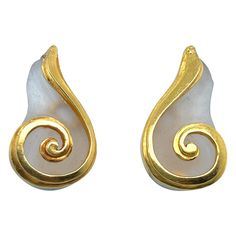 Superb pair of yellow gold and rock crystal earrings by Greek jeweler Lalaounis. Crafted in 21 karat yellow gold, each in form of a stylised shell and decorated with an inlay of semi-transparent frosted rock crystal. The earrings are completed by hinged omega clip backs in 18 karat yellow gold. They are light, comfortable and easy to wear day and night. Suitable for unpierced ears. Greek master Ilias Lalaounis founded his iconic jewelry brand in 1968 and became world famous for its luxurious gol Greek Jewellery, Iconic Jewelry, Greek Jewelry, Jewelry Brand, Classic Jewelry, Semi Transparent, Art Accessories, Rock Crystal, World Famous