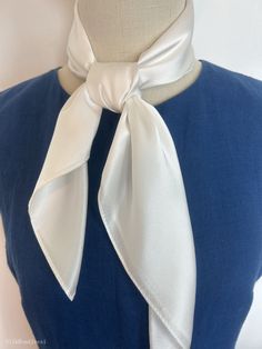 "Plain white natural mulberry silk medium square scarf, size: 65 cm x 65 cm / 26 in x 26 in. Soft, smooth, and lustrous silk charmeuse fabric, breathable and skin-friendly feels very soft and comfortable to wear. Can wear it on both sides which will give different feel and look. Can style in many ways: can wear this scarf as a soft neck scarf, as a hair tie, as a headband scarf, as a wrist scarf, as a purse accessory. Or style it in any way you want with your own sense of creativity! Suitable for all seasons and is a great gift idea for special occasions.  Care Instructions: Pure silk is a type of organic, natural and delicate fabric, please avoid washing if it's not particularly dirty. Gently hand wash cold/lukewarm with mild detergent, natural air dry. Stored in a cool, dry, and dark pla Elegant White Rectangular Scarves, Classic Silk Scarf For Spring Formal Events, Classic Spring Scarves For Formal Occasions, Elegant Rectangular Silk Scarf For Spring, White Classic Silk Scarf, Classic White Silk Scarf, Classic Formal Silk Scarf For Spring, Classic Formal Scarves For Spring, Classic Spring Formal Scarves